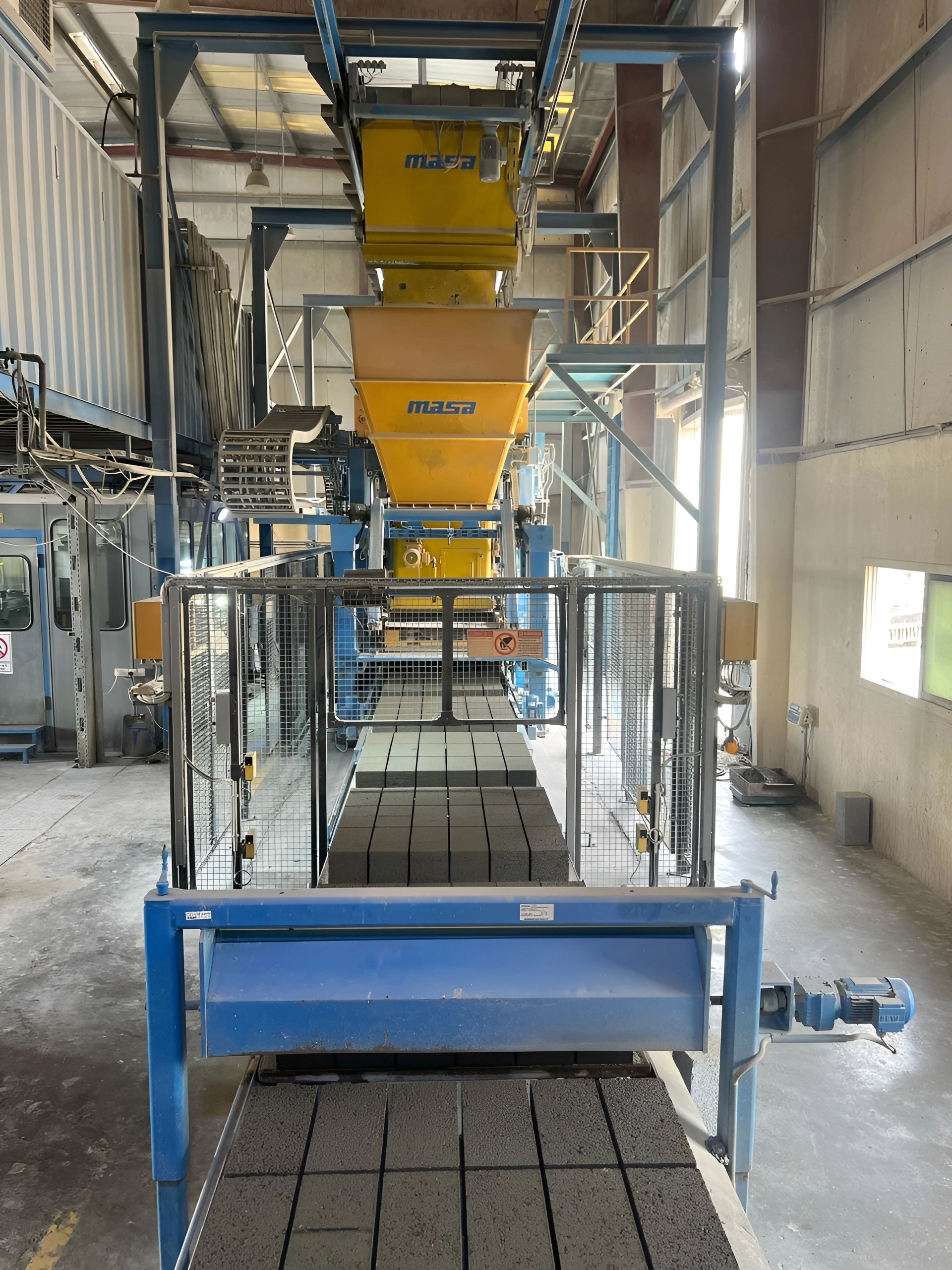 MASA block manufacturing machine inside factory